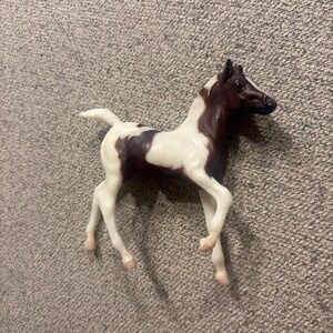 This is a vintage Breyer Classics Andalusian Pinto Foal